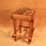 Wooden Stool Example of wooden stool upholstered w/ Kilim